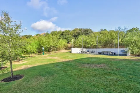a view of a golf course with a lake