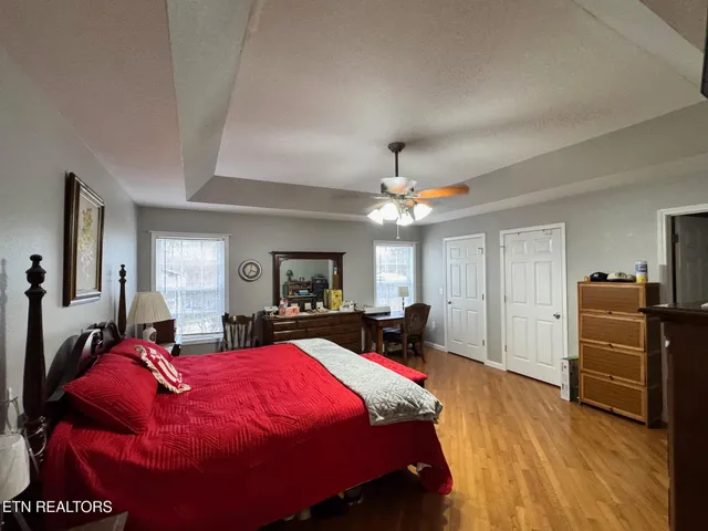 a bedroom with a bed and furniture