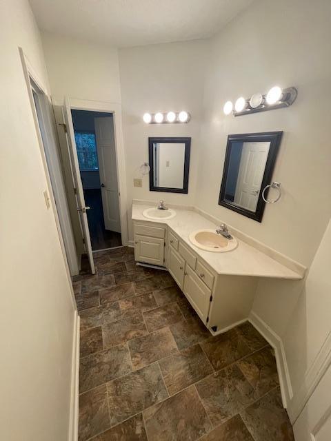 103 Danforth Drive Cary, NC 27511 - Photo 11 of 13 a bathroom with a sink and a mirror