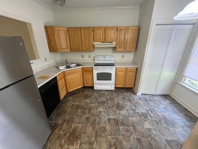 103 Danforth Drive Cary, NC 27511 - Photo 3 of 13 a kitchen with a sink a stove and cabinets