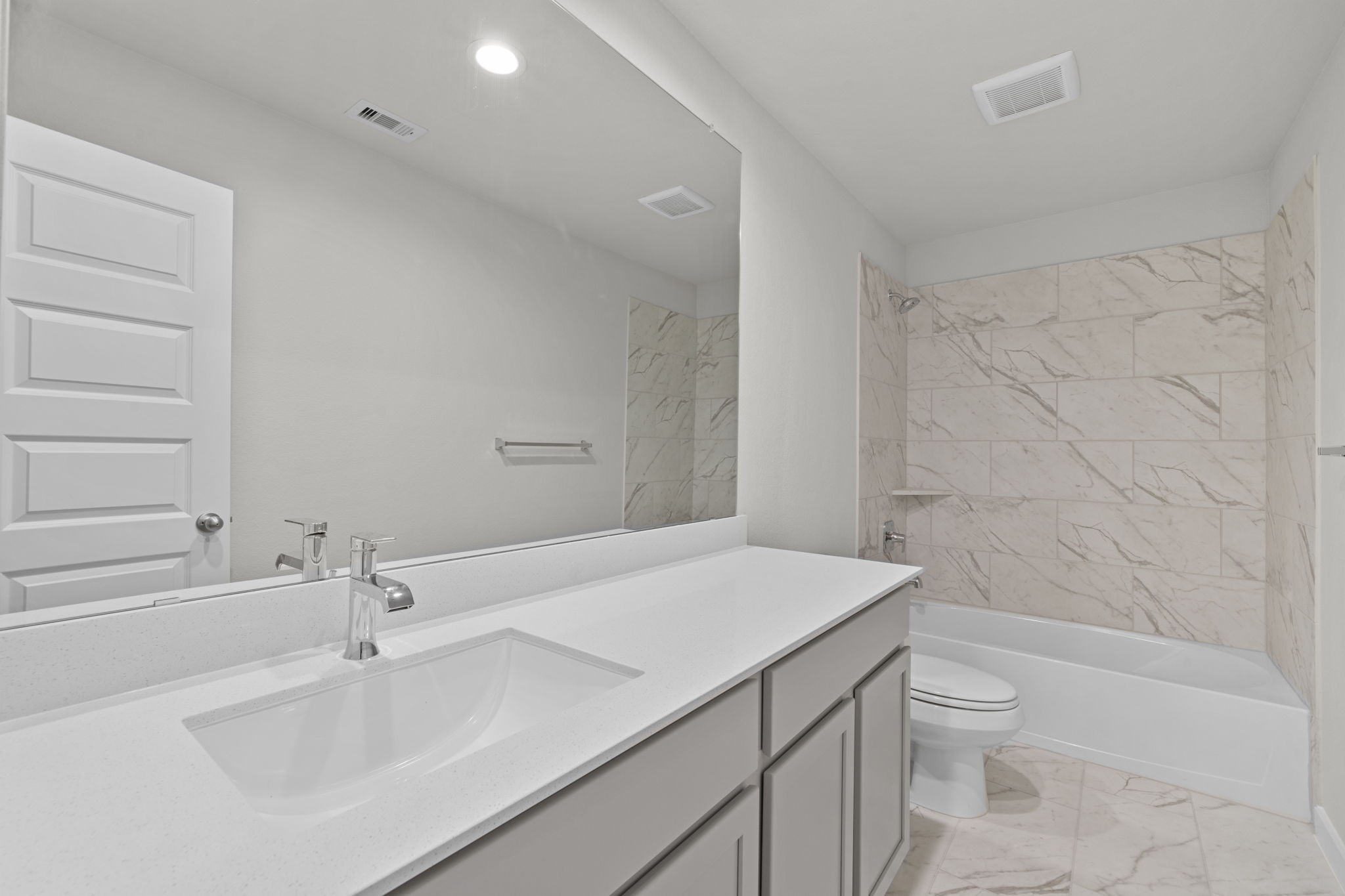 3015 Boulder Ridge Drive Rosenberg, TX 77471 - Photo 28 of 34 a bathroom with a sink a toilet and shower