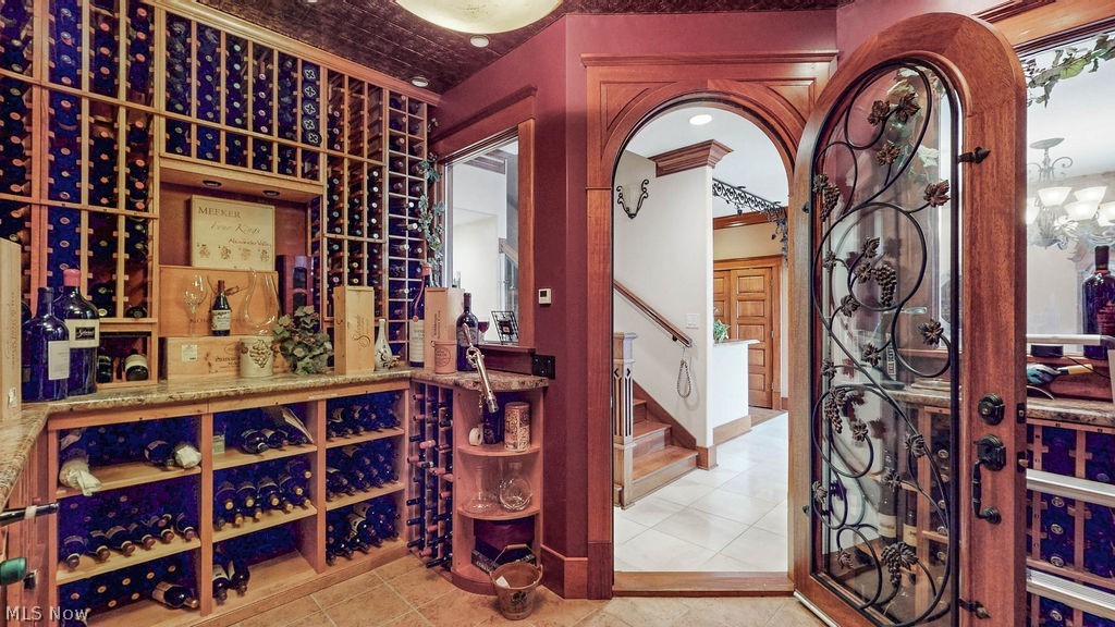 1431 Cedar Point Road Sandusky, OH 44870 - Photo 12 of 50 Wine room with tile patterned floors