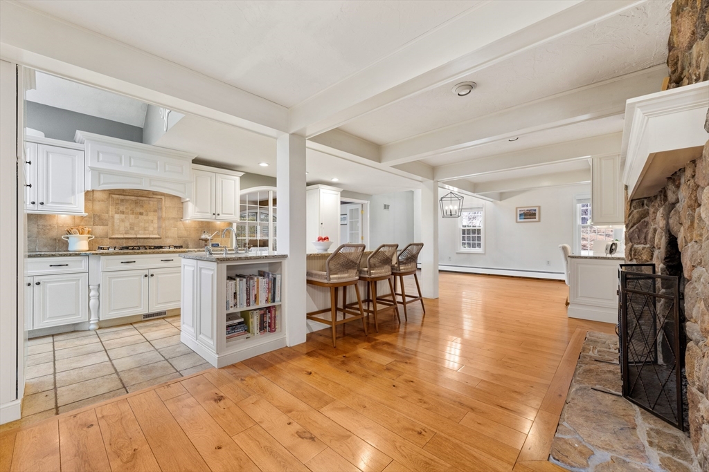 63 Farm Hill Road North Attleboro, MA 02760 - Photo 12 of 42 a open kitchen with white cabinets and stainless steel appliances