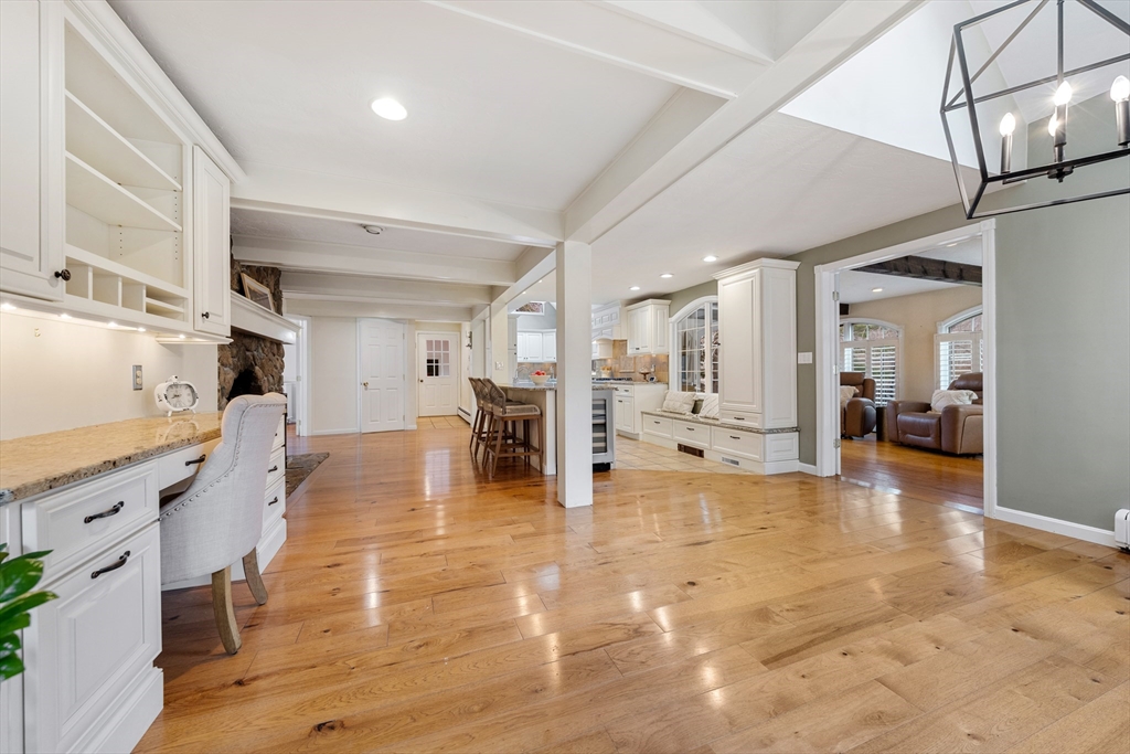 63 Farm Hill Road North Attleboro, MA 02760 - Photo 14 of 42 a view of a living room kitchen and a livingroom with furniture wooden floor
