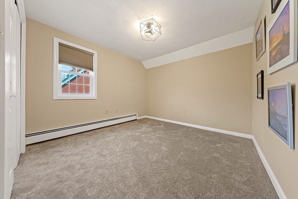 63 Farm Hill Road North Attleboro, MA 02760 - Photo 24 of 42 an empty room with windows and closet