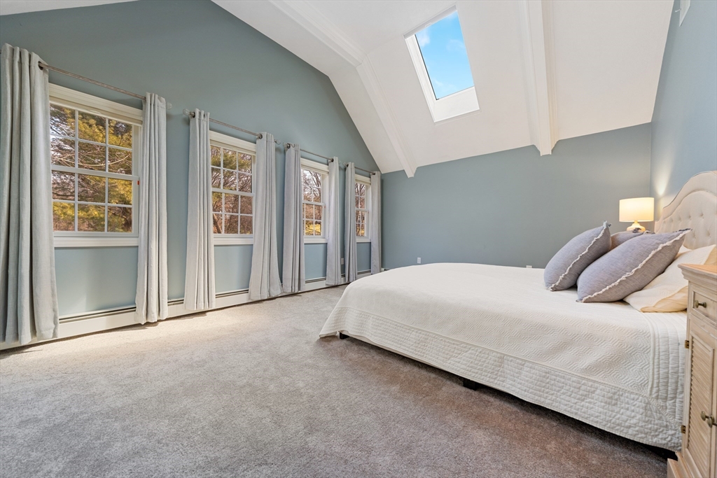 63 Farm Hill Road North Attleboro, MA 02760 - Photo 27 of 42 a bedroom with a bed and a large window