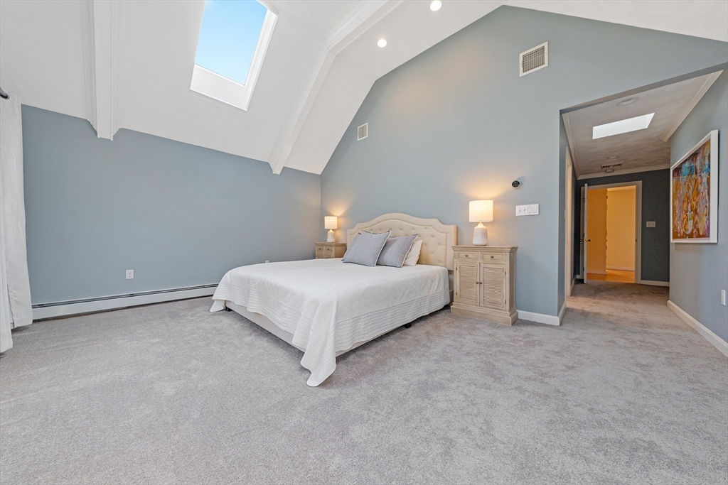 63 Farm Hill Road North Attleboro, MA 02760 - Photo 28 of 42 a bedroom with a bed and a lamp