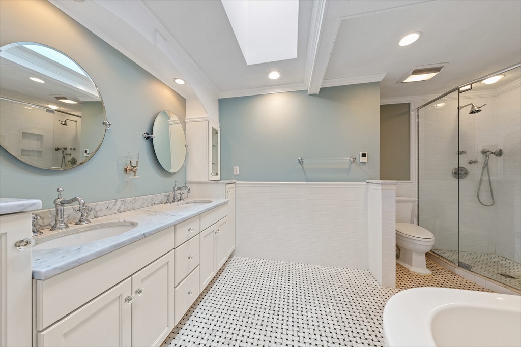 63 Farm Hill Road North Attleboro, MA 02760 - Photo 29 of 42 a spacious bathroom with a sink a toilet a mirror a vanity and shower