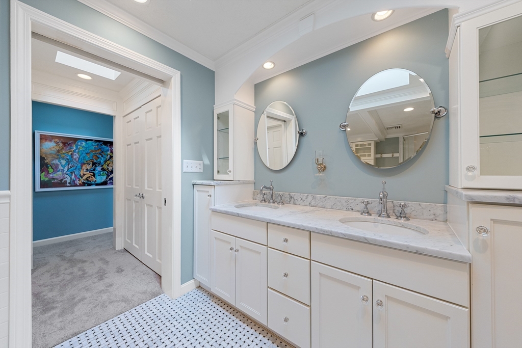 63 Farm Hill Road North Attleboro, MA 02760 - Photo 32 of 42 a bathroom with a double vanity sink and a mirror