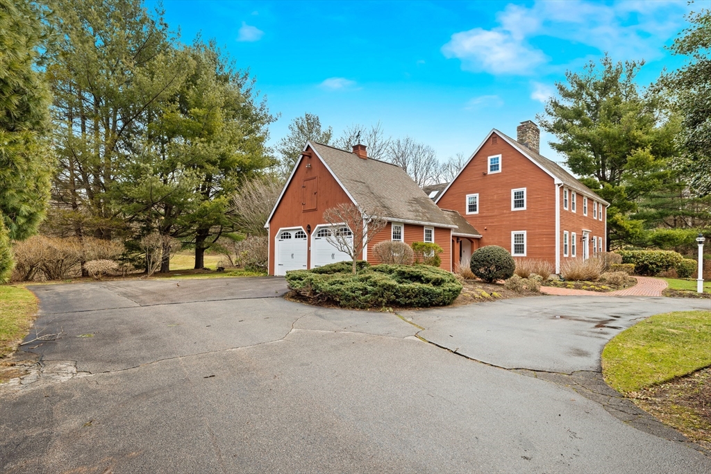63 Farm Hill Road North Attleboro, MA 02760 - Photo 37 of 42 a front view of a house with garden