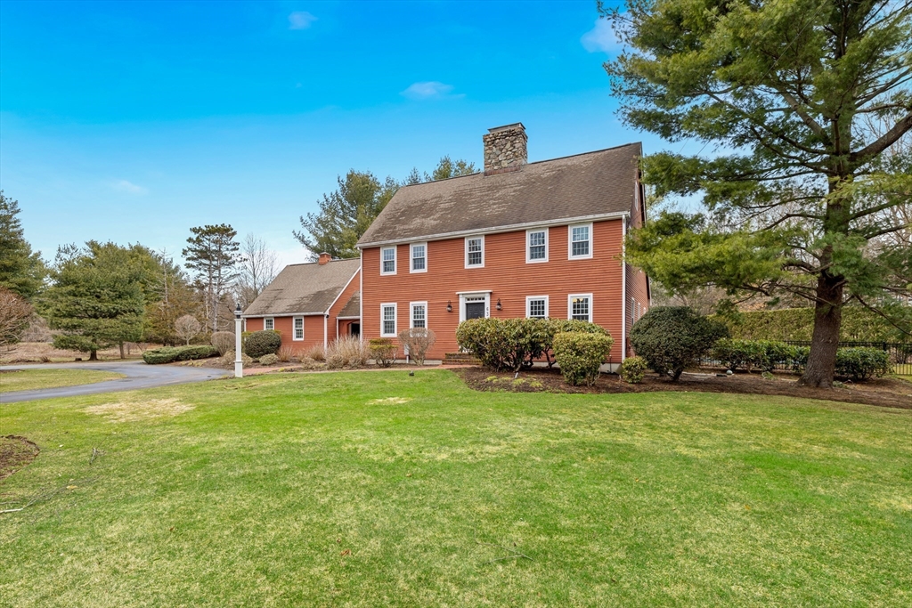 63 Farm Hill Road North Attleboro, MA 02760 - Photo 39 of 42 a front view of a house with a yard