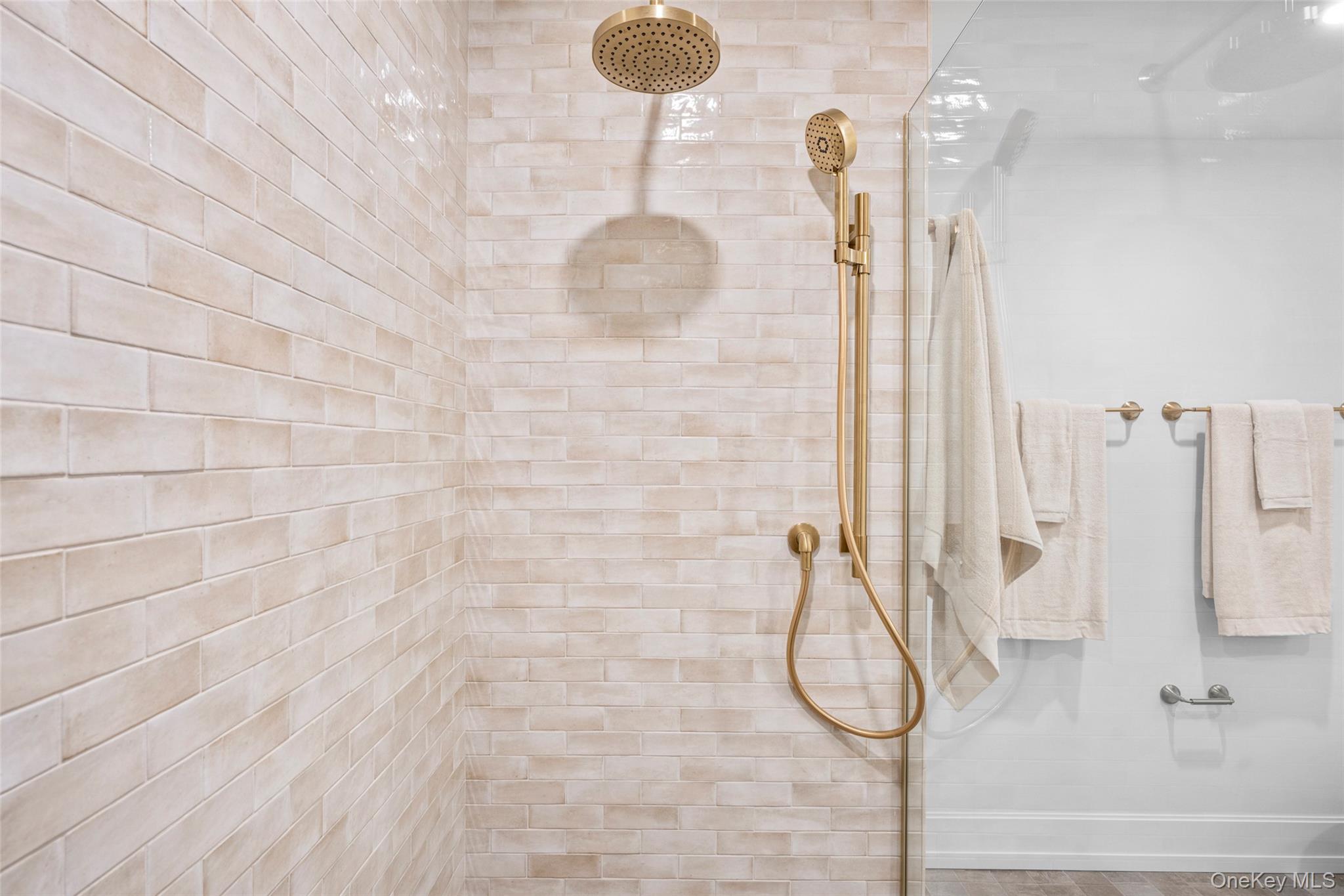 25 North Riverside Avenue, Unit 211 Croton-on-Hudson, NY 10520 - Photo 17 of 27 a bathroom with a shower