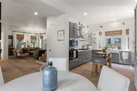 a living room with furniture fireplace and flat screen tv