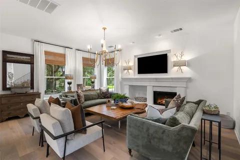 a large white bed in a white room