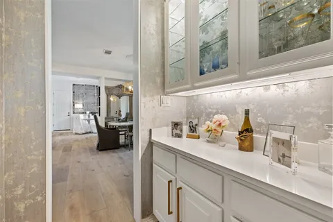 a patio with a patio table and chairs