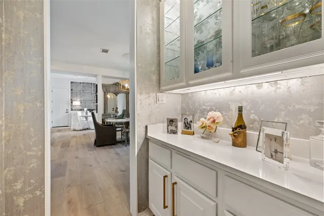 a patio with a patio table and chairs