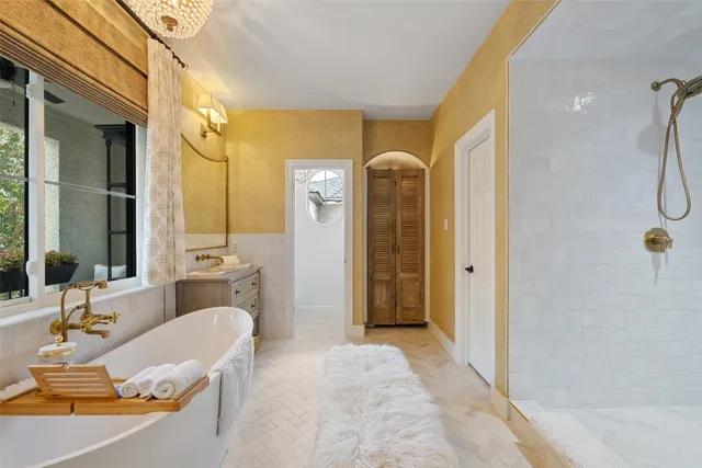 a view of a park with large trees