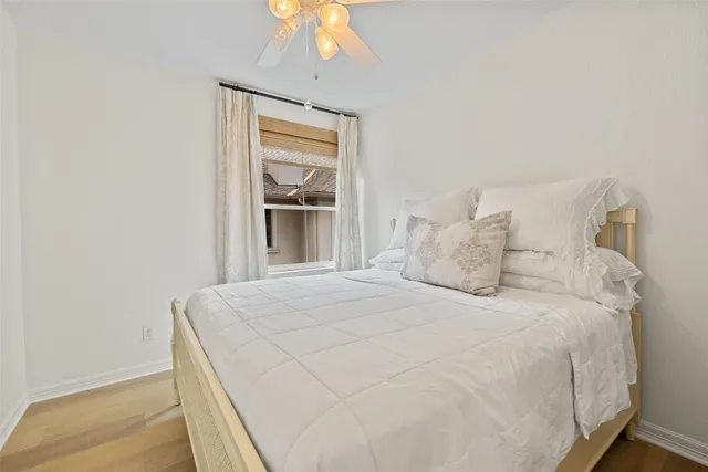 a patio with a patio table and chairs