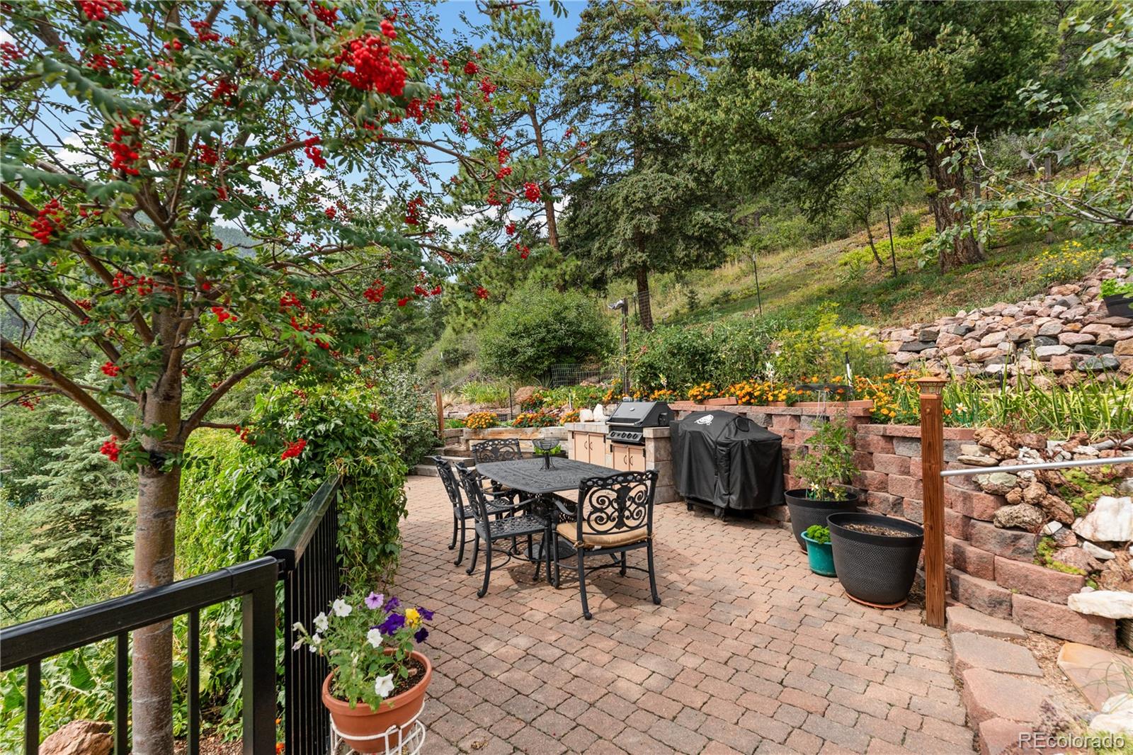 64 Highland Road Palmer Lake, CO 80133 - Photo 17 of 17 a city view with a seating space