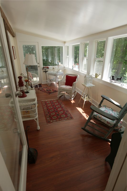 29 Glendale Road Stockbridge, MA 01262 - Photo 8 of 23 a living room with furniture stove and a large window