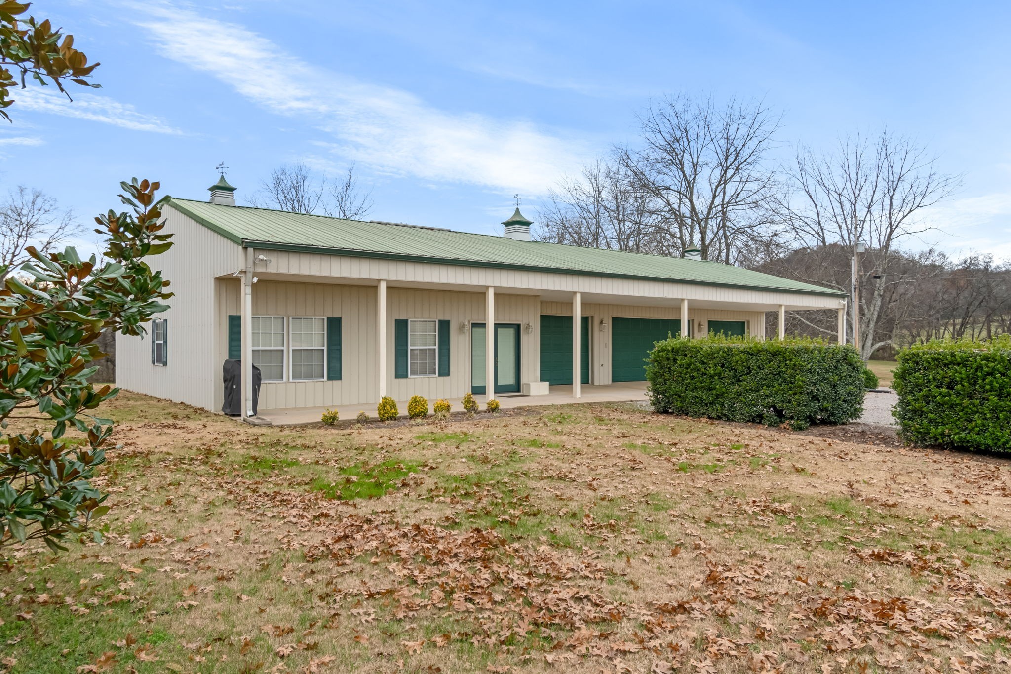 3100 Floyd Road Eagleville, TN 37060 - Photo 6 of 62 a front view of a house with a garden
