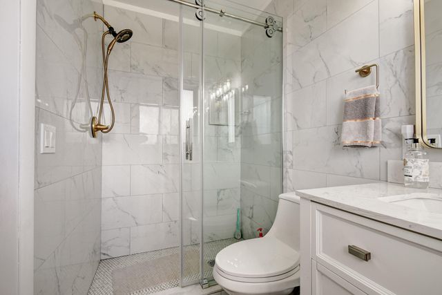 a view of livingroom with washer and dryer