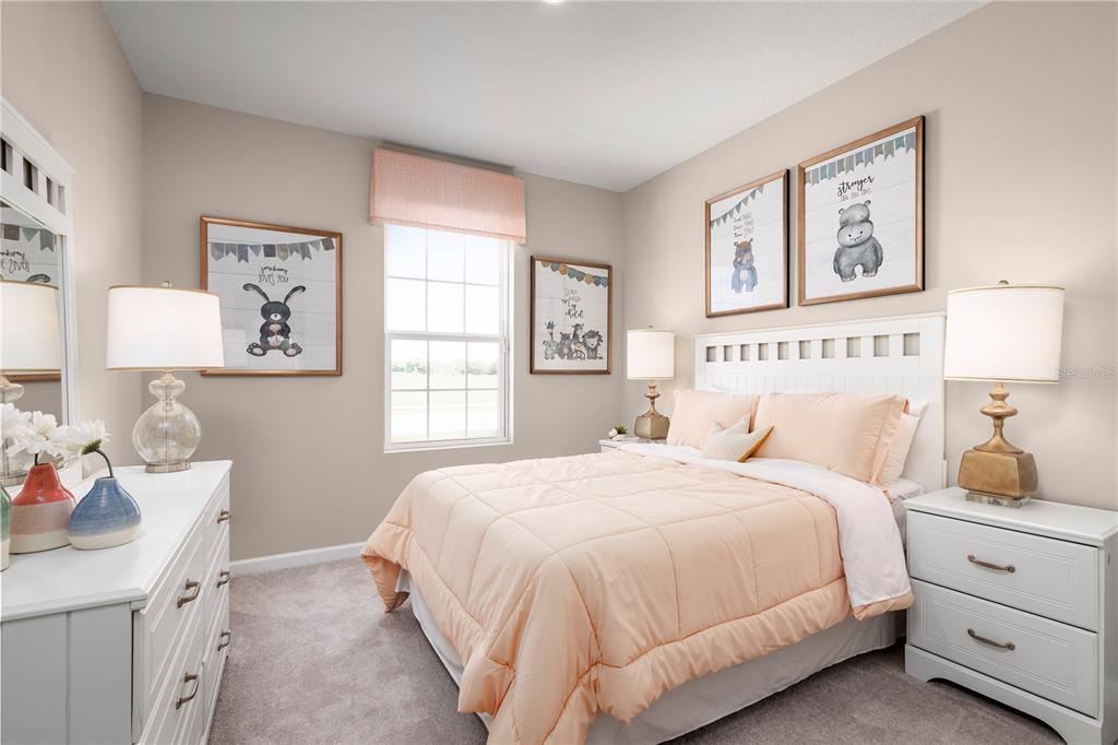 1186 Turtle Is Road Fruitland Park, FL 34731 - Photo 9 of 11 a bedroom with a bed and a window