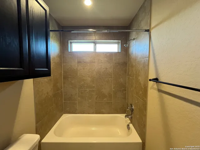 a bathroom with a bathtub