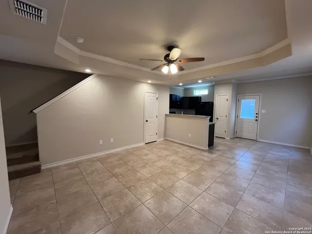 a view of a livingroom with a kitchen