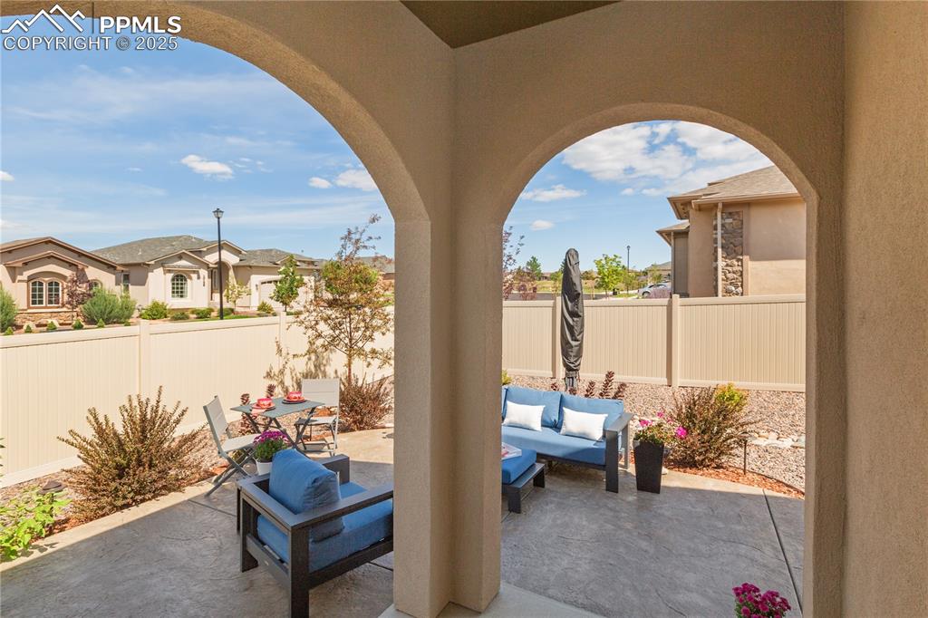 12516 Stone Valley Drive Peyton, CO 80831 - Photo 15 of 44 a living room with furniture and a large window