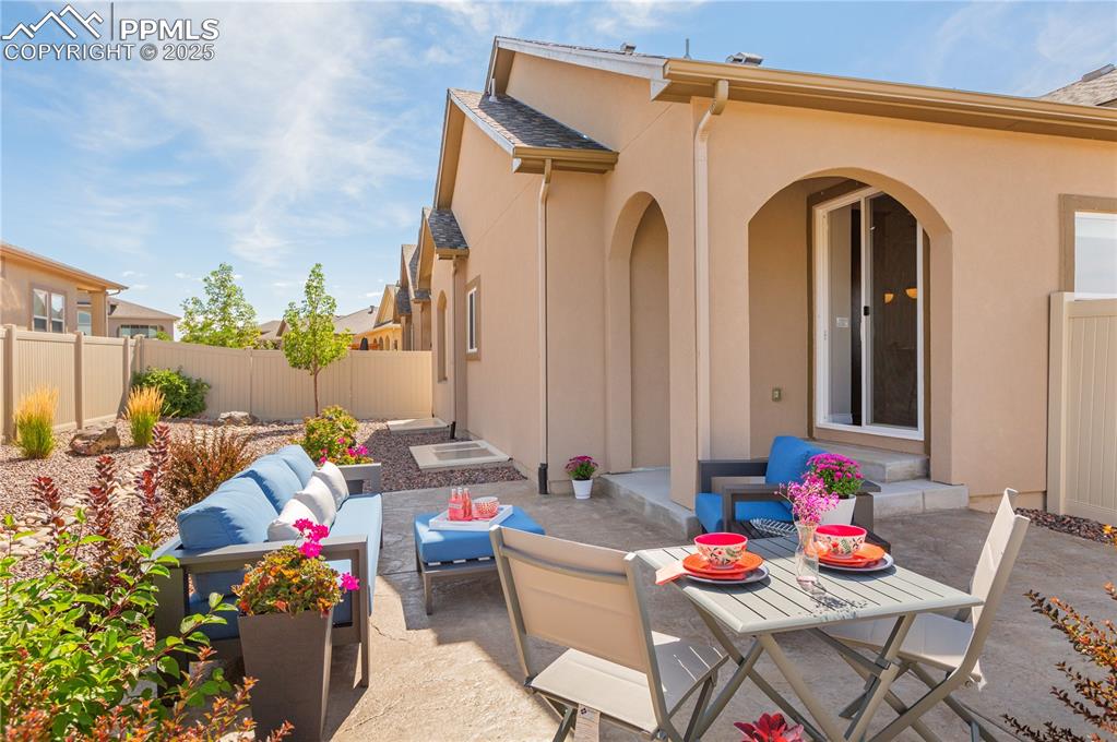 12516 Stone Valley Drive Peyton, CO 80831 - Photo 17 of 44 a outdoor living space with patio furniture
