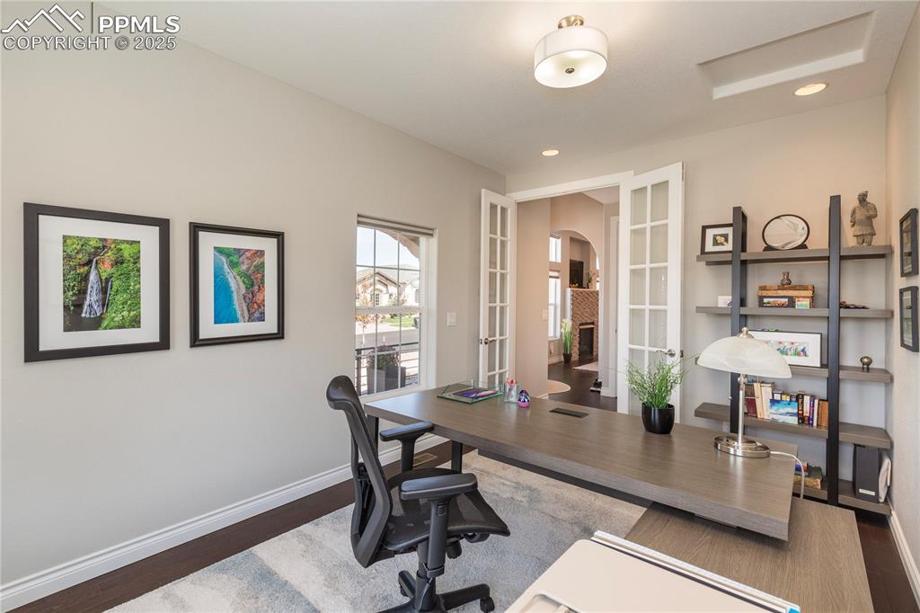 12516 Stone Valley Drive Peyton, CO 80831 - Photo 28 of 44 a workspace with furniture and window