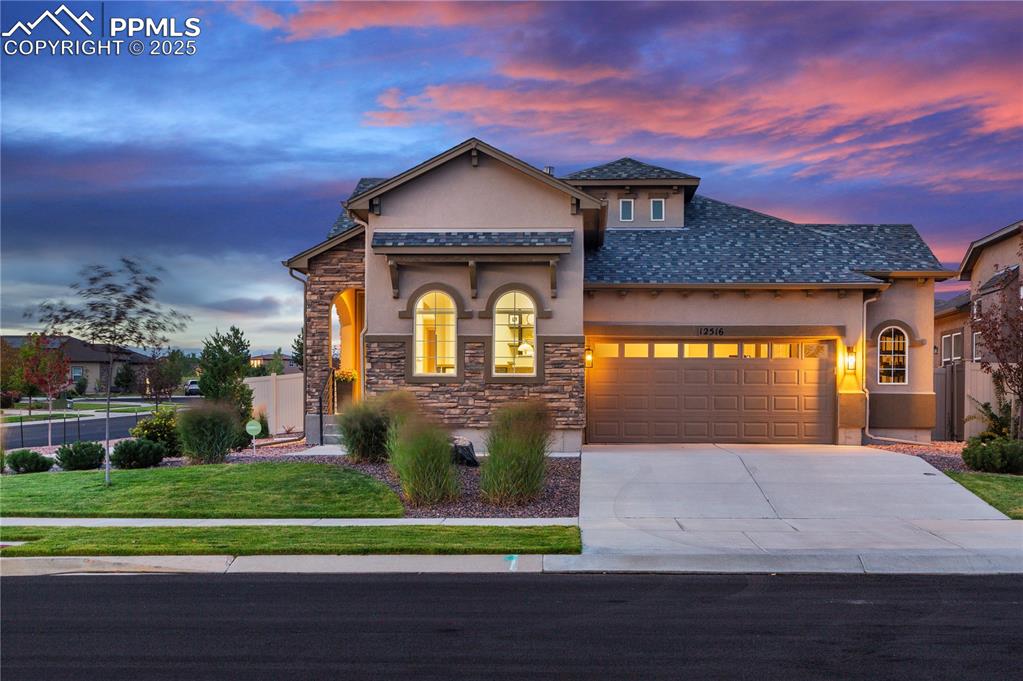 12516 Stone Valley Drive Peyton, CO 80831 - Photo 44 of 44 a front view of a house with a yard