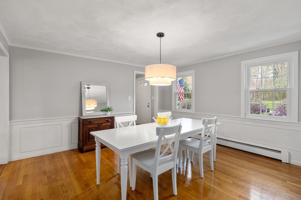 27 Middle Road Sudbury, MA 01776 - Photo 16 of 33 a view of a dining room with furniture window and wooden floor
