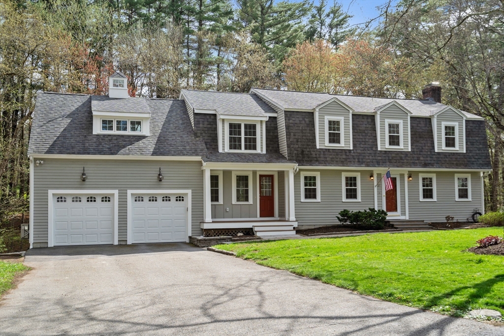 27 Middle Road Sudbury, MA 01776 - Photo 2 of 33 a view of a white house with a yard