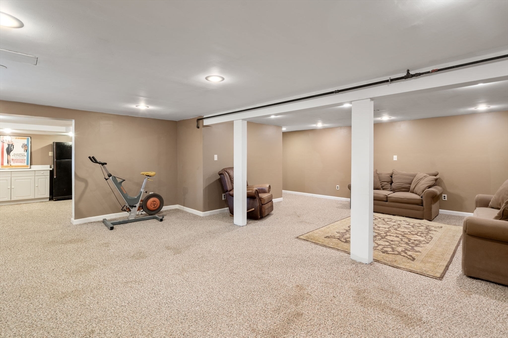 27 Middle Road Sudbury, MA 01776 - Photo 28 of 33 a view of a room with gym equipment