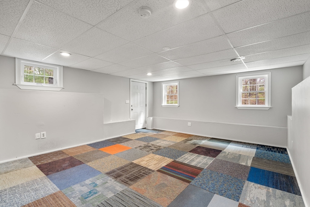 27 Middle Road Sudbury, MA 01776 - Photo 29 of 33 a view of an empty room with a window