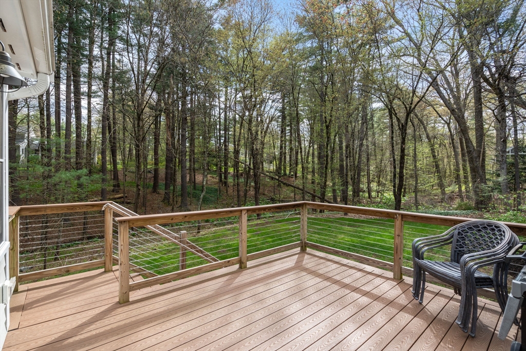 27 Middle Road Sudbury, MA 01776 - Photo 30 of 33 a view of deck with two chairs and wooden floor