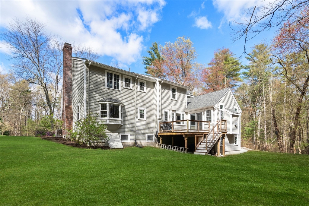 27 Middle Road Sudbury, MA 01776 - Photo 31 of 33 a front view of a house with a garden