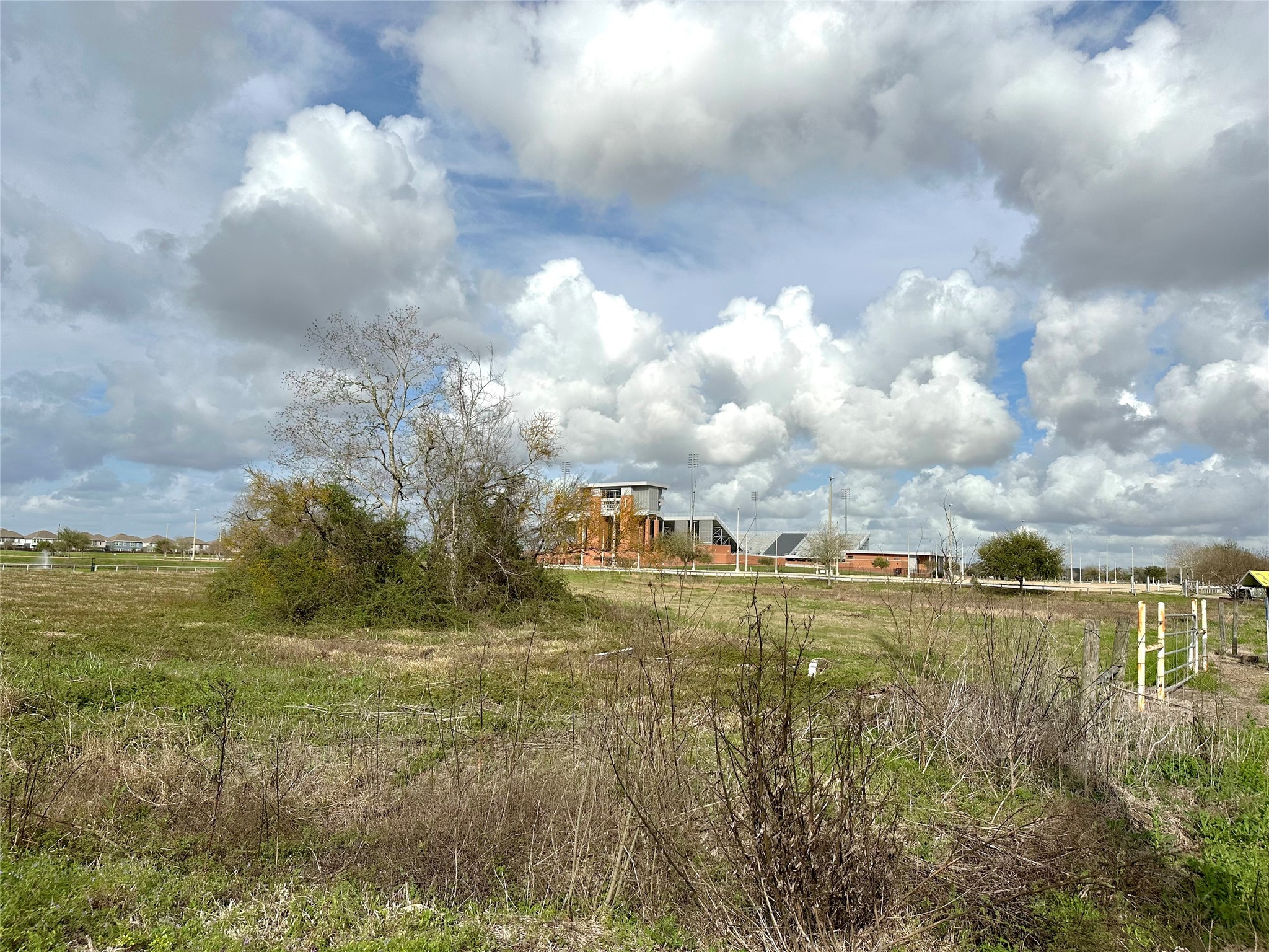 4011 Davenport Parkway Rosharon, TX 77583 - Photo 2 of 7 a view of a lake with a big yard