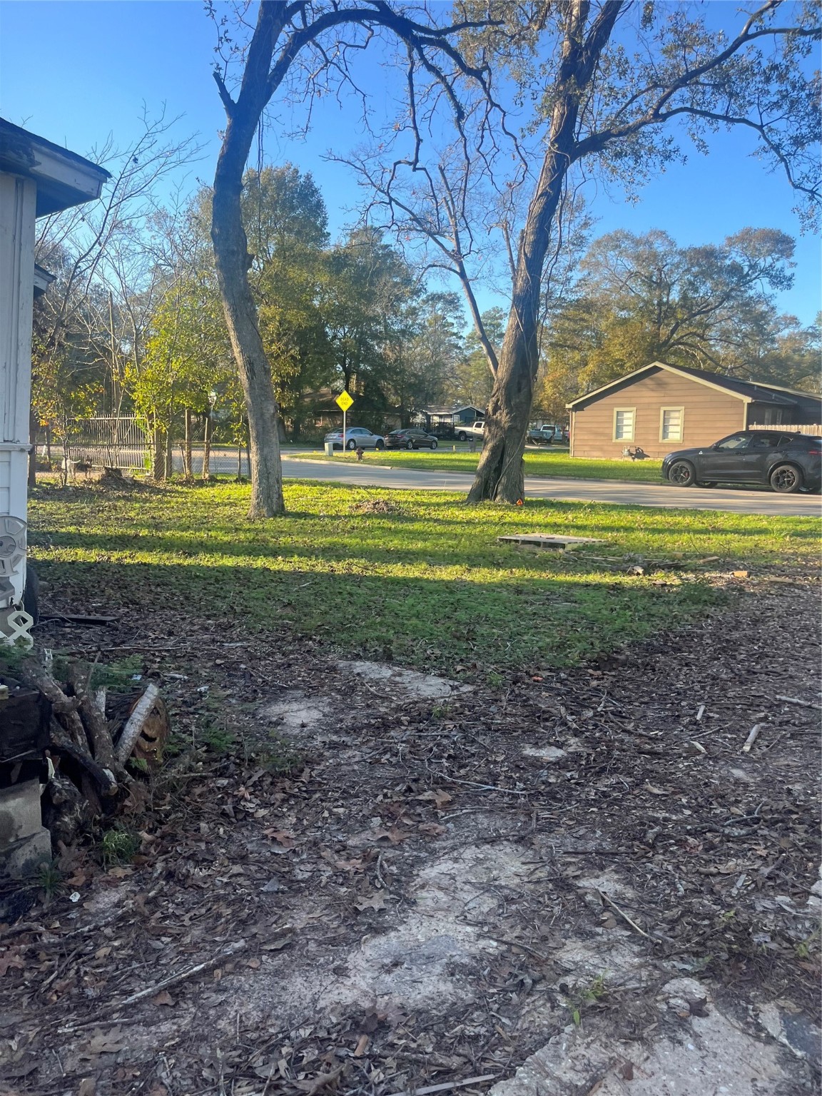 409 Wagers Street Conroe, TX 77301 - Photo 16 of 21 a view of outdoor space with trees