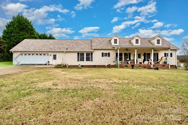 a front view of a building with garden