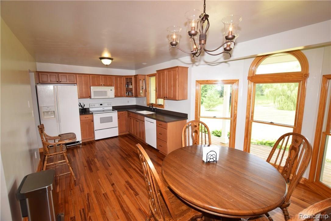 6501 Cook Road Swartz Creek, MI 48473 - Photo 4 of 26 Kitchen and Informal Dining Area