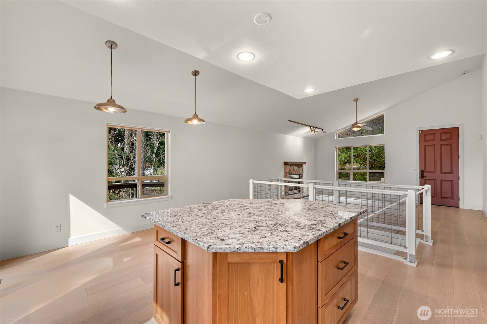 4135 Agate Road Bellingham, WA 98226 - Photo 11 of 36 a kitchen with granite countertop kitchen island a counter space a sink appliances and living room
