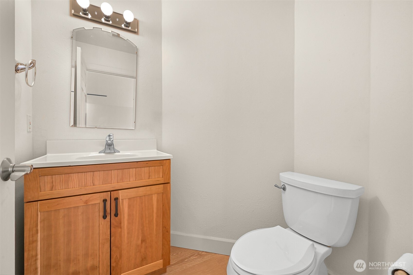 4135 Agate Road Bellingham, WA 98226 - Photo 19 of 36 a bathroom with a toilet sink and mirror