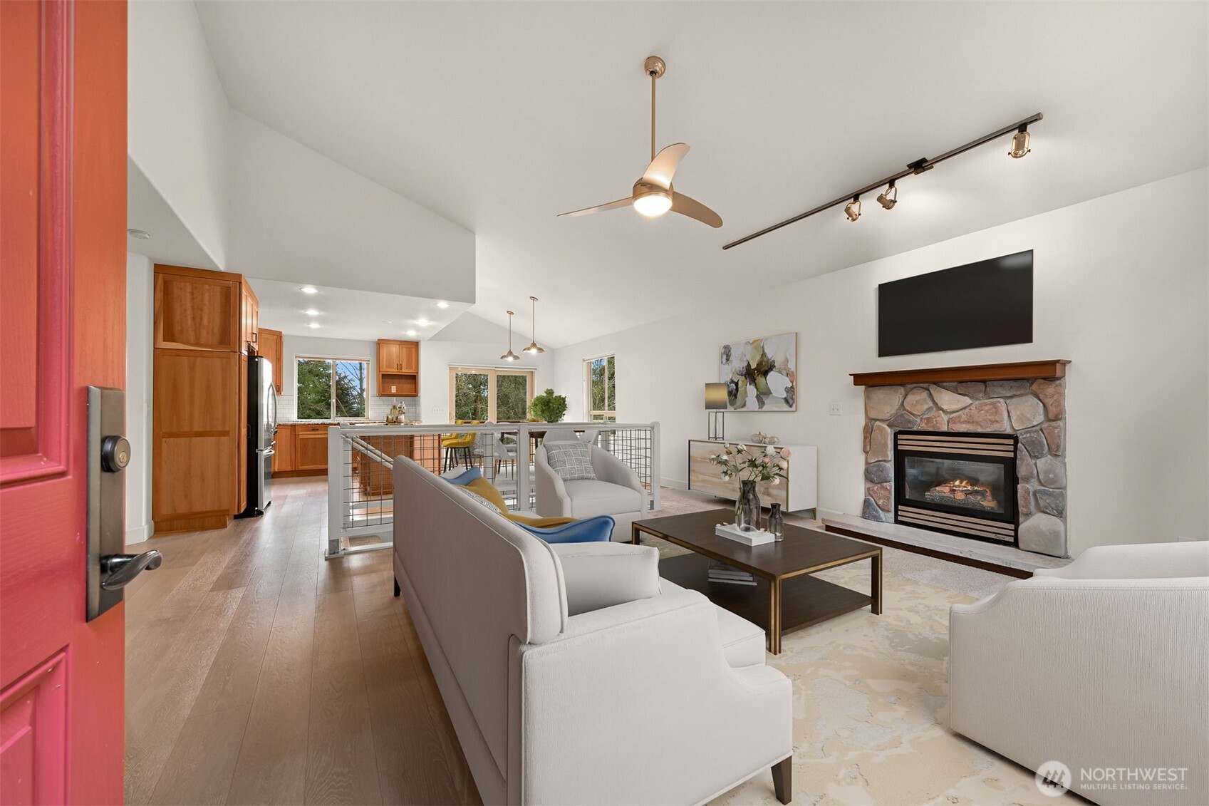 4135 Agate Road Bellingham, WA 98226 - Photo 2 of 36 a living room with furniture a fireplace and a flat screen tv