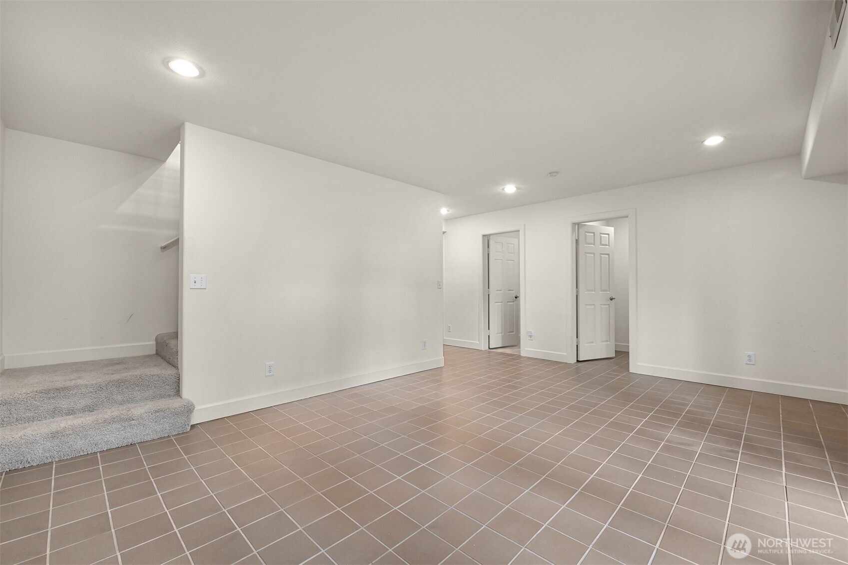 4135 Agate Road Bellingham, WA 98226 - Photo 24 of 36 an empty room with white walls and tiles