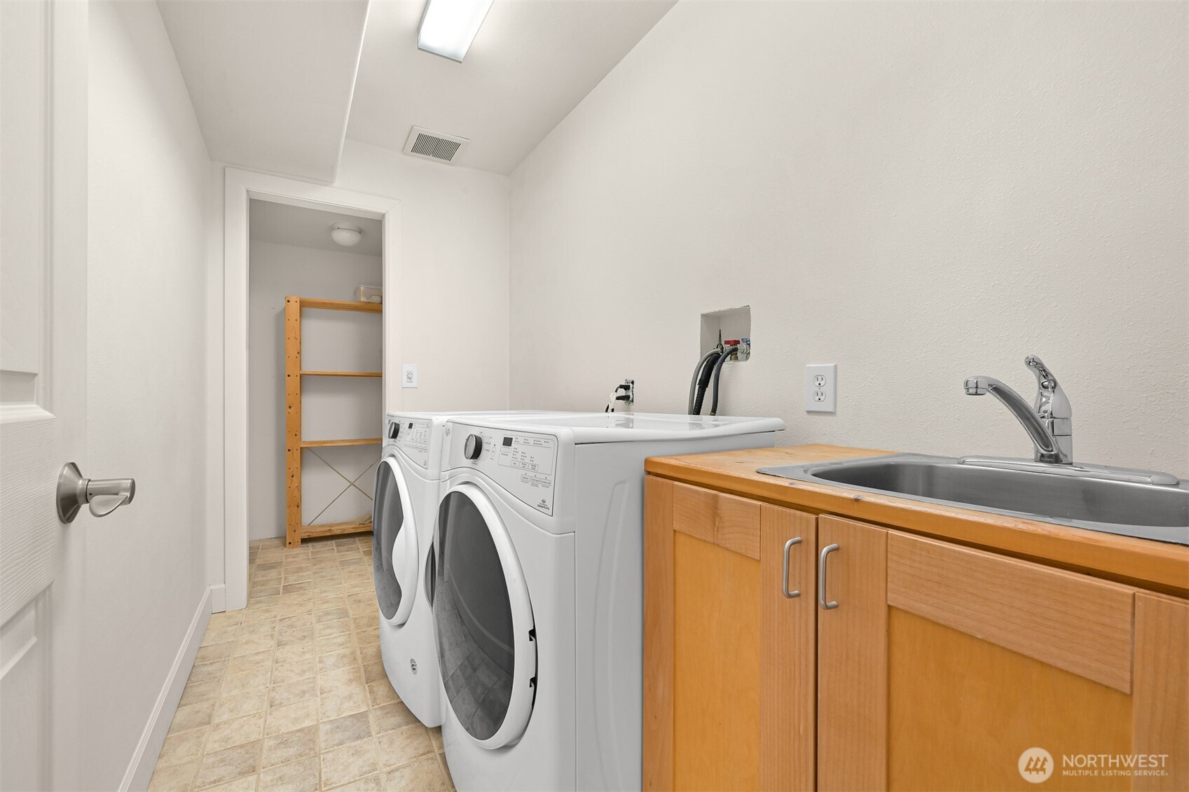 4135 Agate Road Bellingham, WA 98226 - Photo 25 of 36 a utility room with dryer and washer