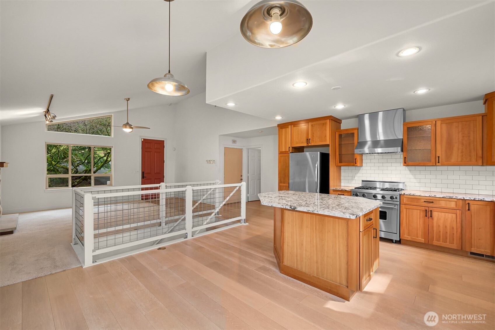 4135 Agate Road Bellingham, WA 98226 - Photo 7 of 36 a large kitchen with stainless steel appliances granite countertop a stove and cabinets