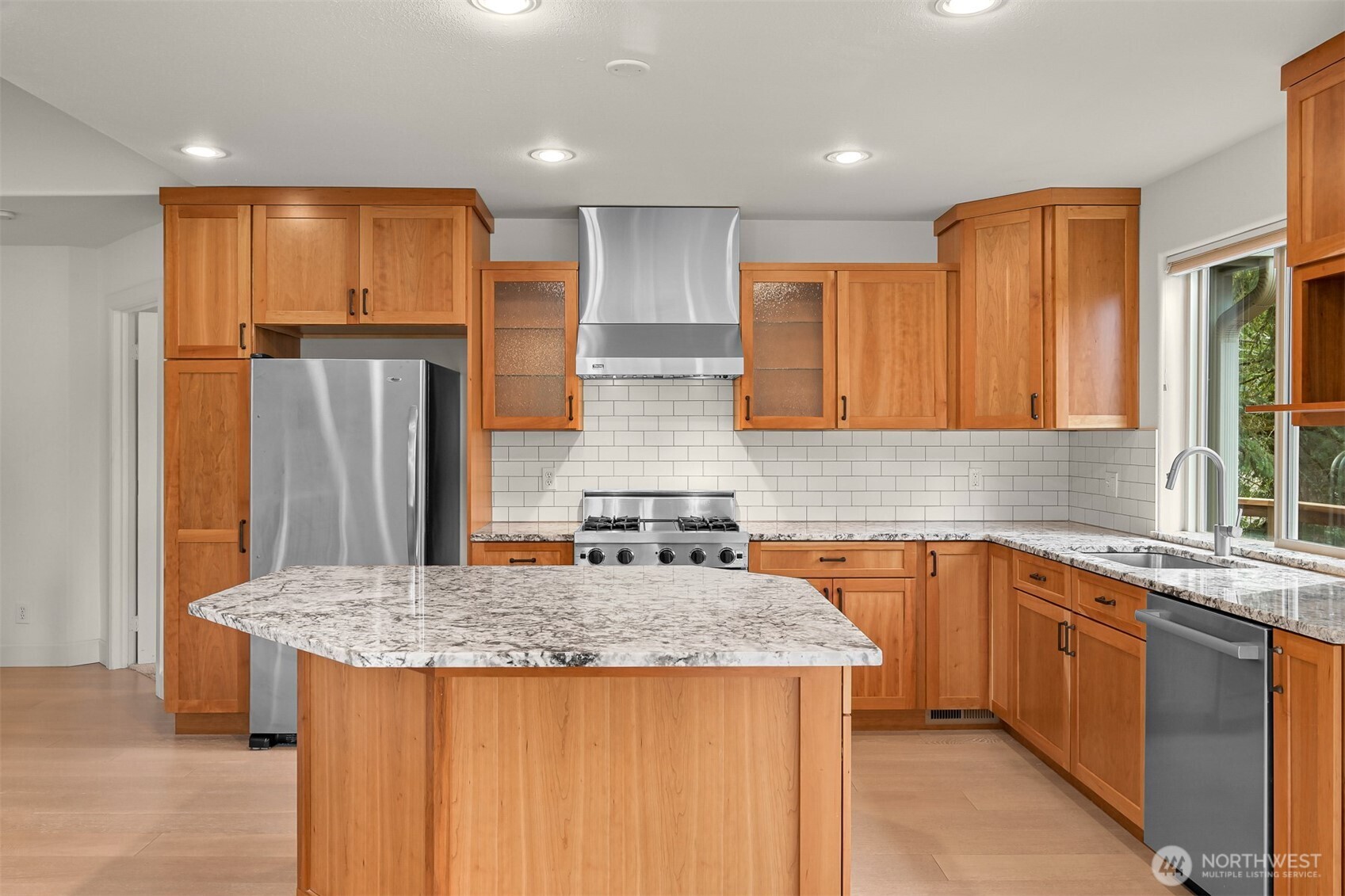 4135 Agate Road Bellingham, WA 98226 - Photo 8 of 36 a kitchen with stainless steel appliances granite countertop a sink and a refrigerator